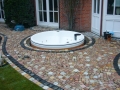 Rotospa runder Gartenwhirlpool eingelassen by Wellnessdrops